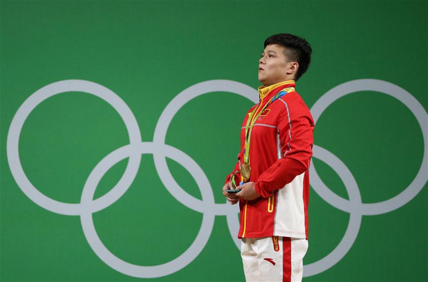 男子56キロ級重量挙げ、中国の龍清泉選手が金