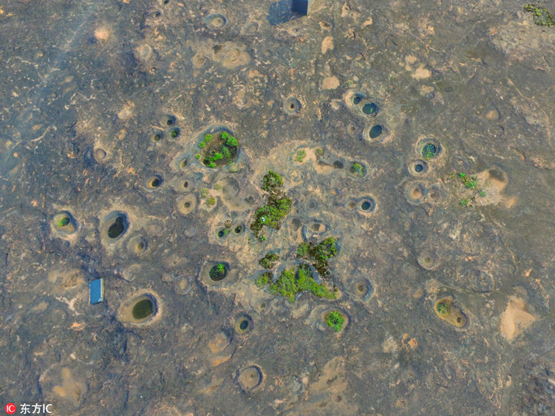 湖南省安仁県で200万年前の漩渦石を発見
