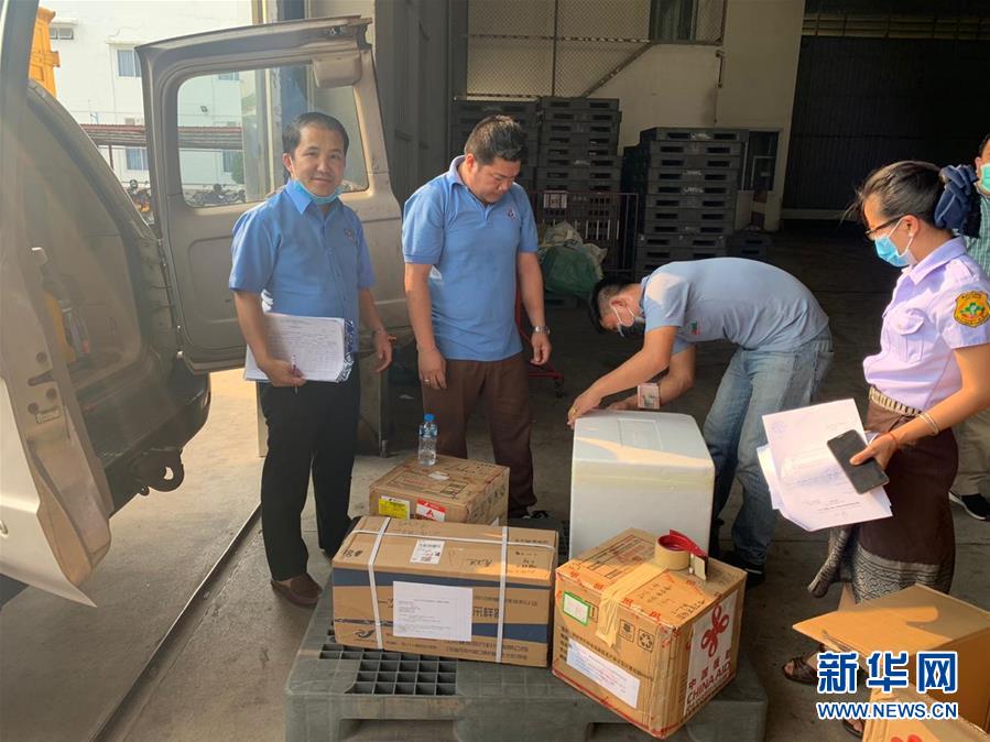 中国政府がラオス政府に新型コロナウイルス検査試薬キット提供 