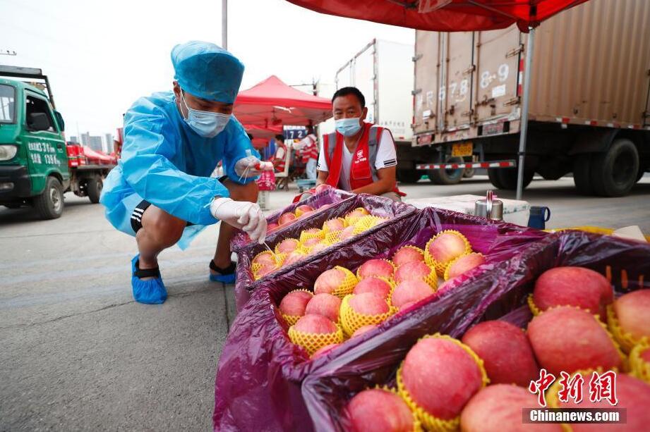 北京新発地卸売市場が段階的に再開　全取引オンライン化