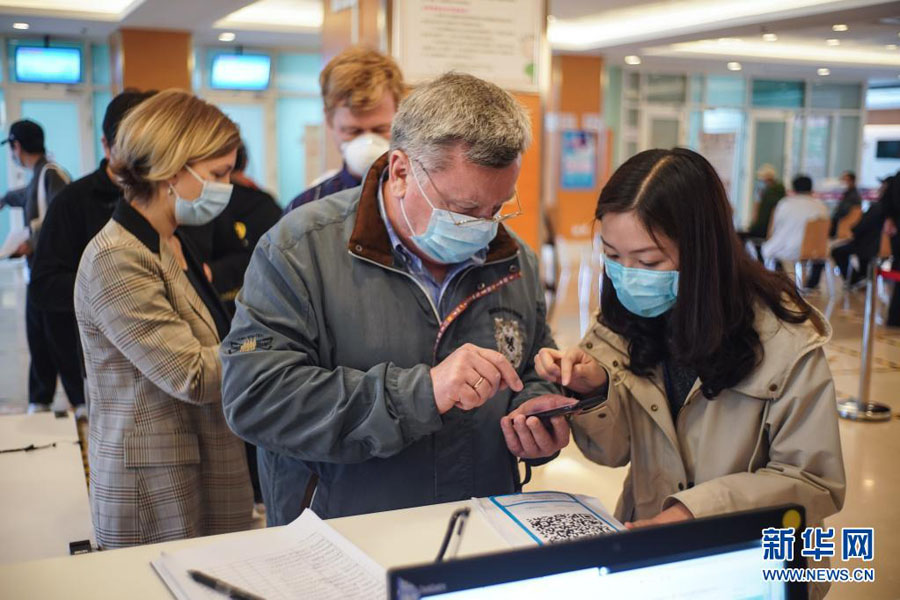 北京市で秩序よく進む外国人への新型コロナワクチン接種作業
