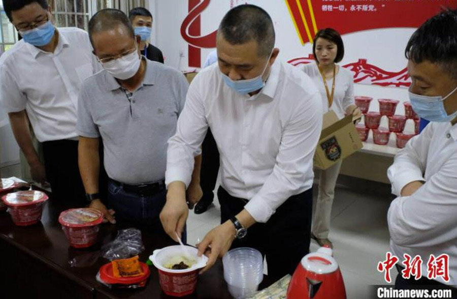 華僑のビジネスマンが広西特産のタニシ麺を視察　広西