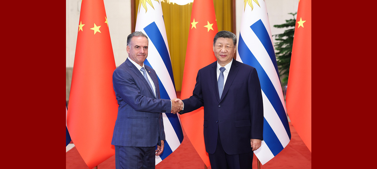 習近平国家主席、ウルグアイのオルシ大統領と会談